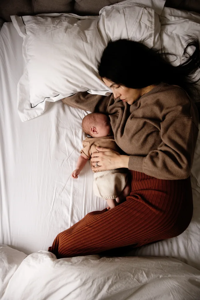 How To Take Care Of Your Mental Health As A New Mom: The Ultimate Guide 3 Isadora Ambrose cosleeping safely with her newborn.