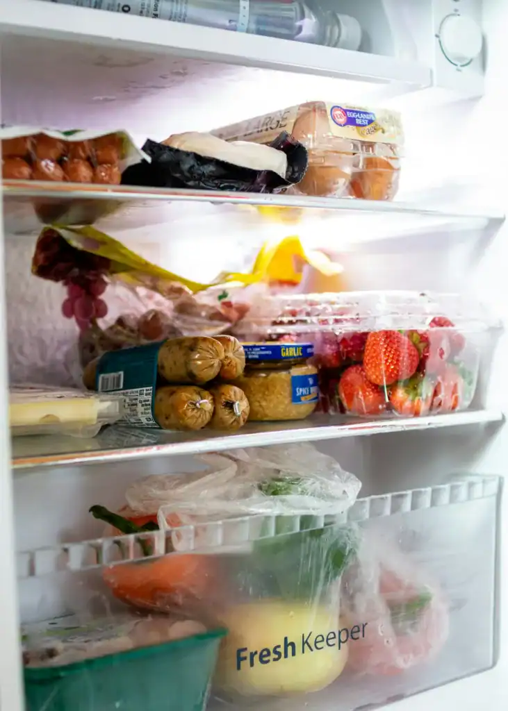 How To Glow-Up Postpartum: 5 Super Realistic Ways to Feel Like Yourself Again 3 image of a fridge that is full of various foods