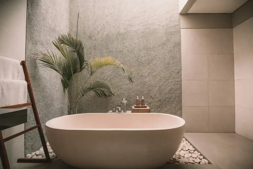 How To Take Care Of Your Mental Health As A New Mom: The Ultimate Guide 7 a bathtub and plant in a quiet bathroom