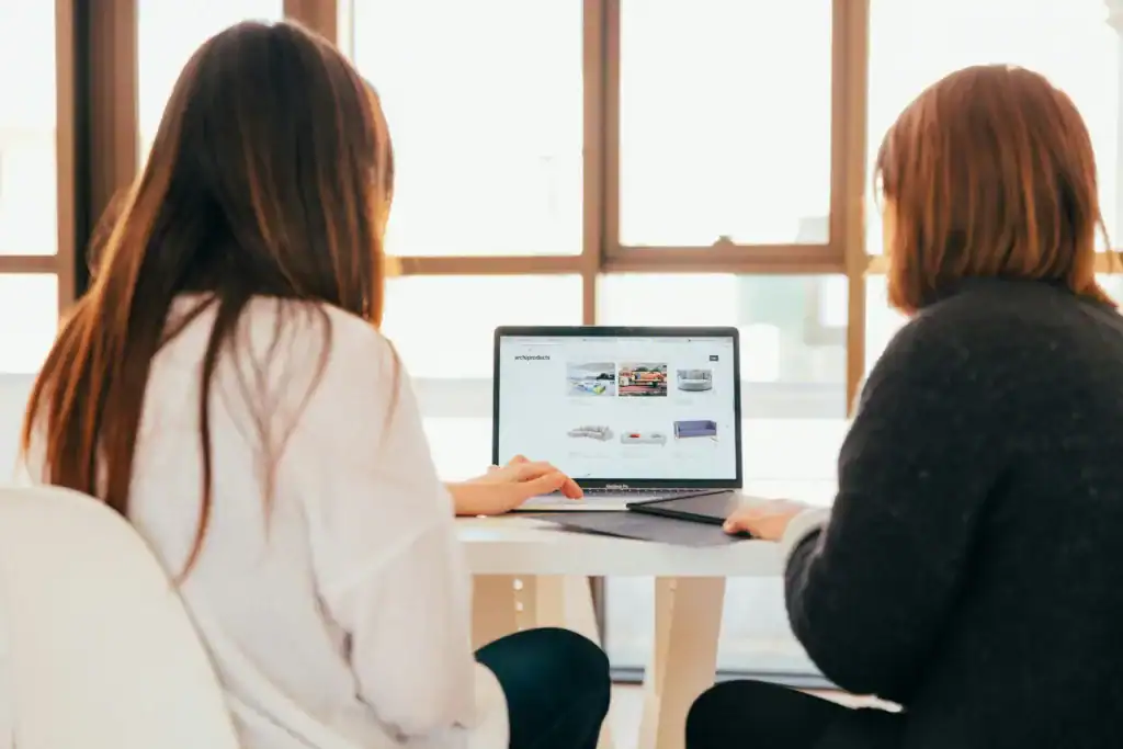 How To Take Care Of Your Mental Health As A New Mom: The Ultimate Guide 15 two woman looking at a computer