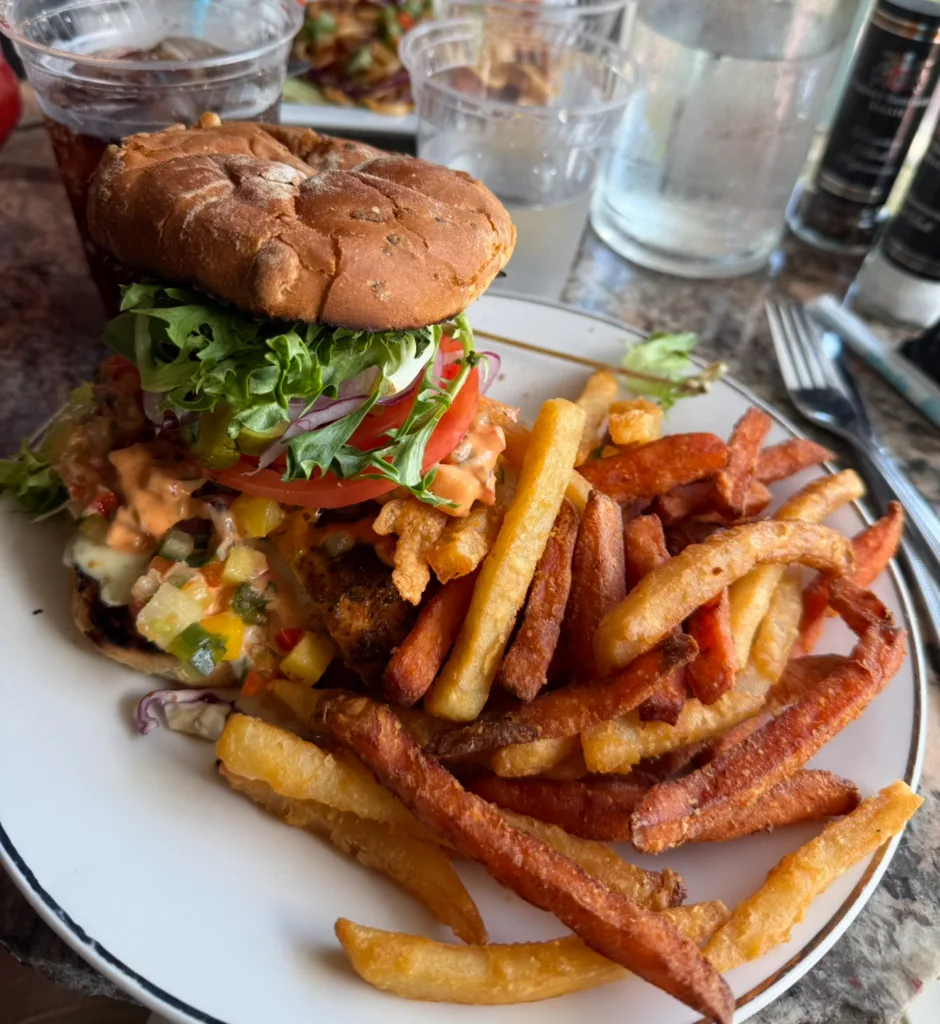How To Lose Weight Quickly While Breastfeeding (Without Losing Your Milk Supply) 2 plate with a yummy burger and sweet potato fries